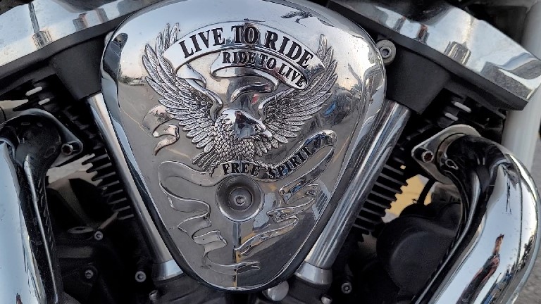 motorcycle engine air filter cover with text: "live to ride, ride to live, free spirit"